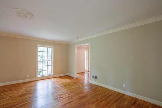 302 Brookwood Ln, Lafayette, GA 30728 - unfurnished room featuring light wood-style flooring, ornamental molding, and baseboards