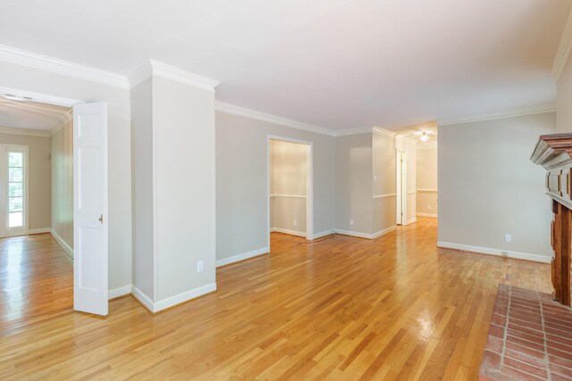 302 Brookwood Ln, Lafayette, GA 30728 - unfurnished living room with light wood-style floors, baseboards, and crown molding