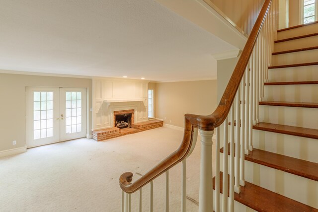 302 Brookwood Ln, Lafayette, GA 30728 - stairway with french doors, ornamental molding, carpet, and baseboards