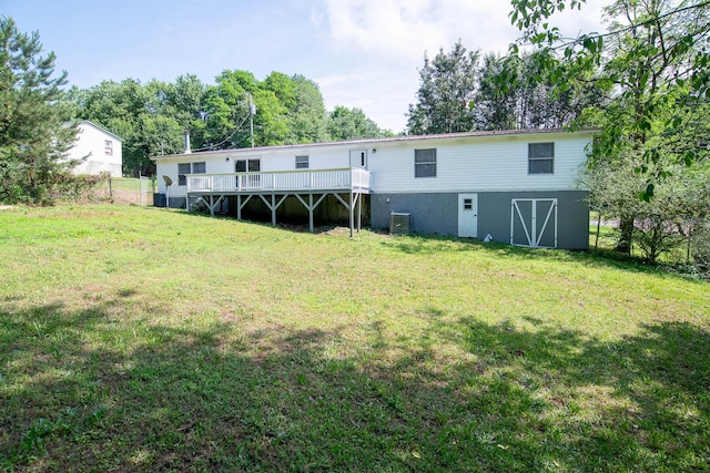 230 Appaloosa Dr, Tunnel Hill, GA 30755 - rear view of property featuring a lawn, central AC, and a deck