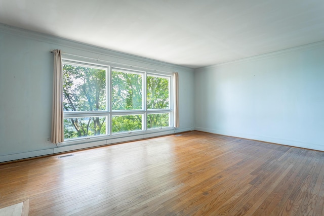 1613 Fairy Dell Trl, Lookout Mountain, GA 30750 - unfurnished room with hardwood / wood-style flooring, crown molding, and baseboards