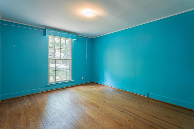 1613 Fairy Dell Trl, Lookout Mountain, GA 30750 - unfurnished room featuring ornamental molding, hardwood / wood-style floors, and baseboards