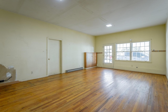 1613 Fairy Dell Trl, Lookout Mountain, GA 30750 - empty room featuring a baseboard radiator and wood finished floors
