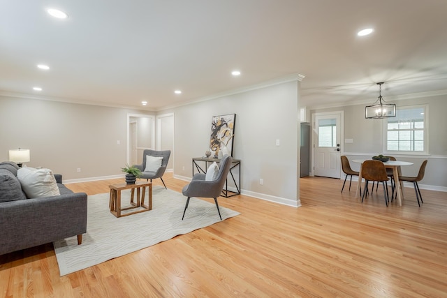 5873 Old Dayton Pike, Chattanooga, TN 37415 - living room featuring light wood-style flooring, crown molding, recessed lighting, baseboards, and a chandelier