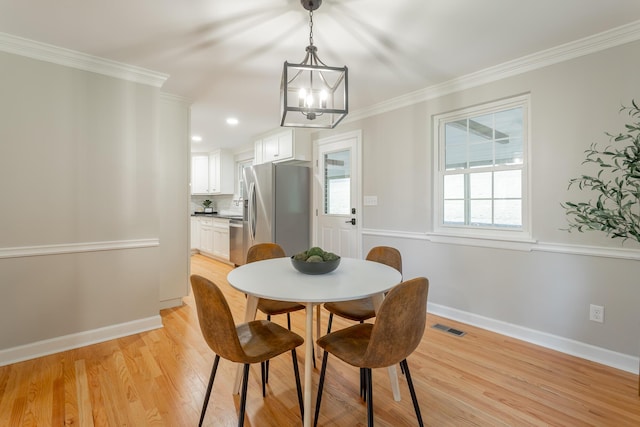 5873 Old Dayton Pike, Chattanooga, TN 37415 - dining area featuring light wood-style flooring, baseboards, a chandelier, crown molding, and recessed lighting
