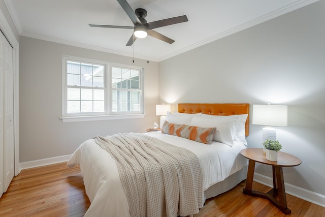 5873 Old Dayton Pike, Chattanooga, TN 37415 - bedroom with baseboards, wood finished floors, a closet, ornamental molding, and a ceiling fan