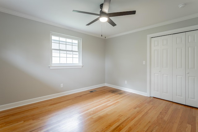 5873 Old Dayton Pike, Chattanooga, TN 37415 - unfurnished bedroom featuring light wood-type flooring, crown molding, baseboards, a closet, and a ceiling fan