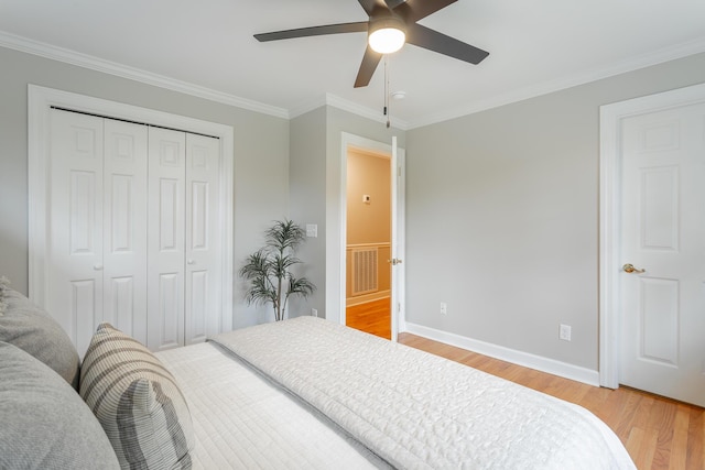 5873 Old Dayton Pike, Chattanooga, TN 37415 - bedroom with light wood-style flooring, crown molding, a closet, baseboards, and ceiling fan