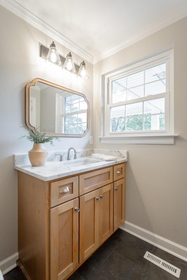5873 Old Dayton Pike, Chattanooga, TN 37415 - bathroom featuring vanity, healthy amount of natural light, ornamental molding, baseboards, and tile patterned flooring