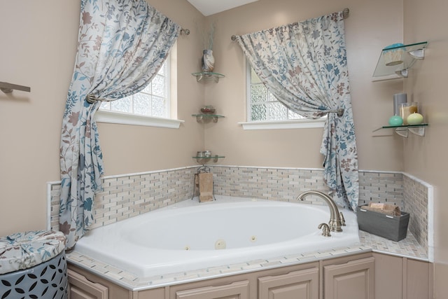 6245 Heritage Ridge Dr, Hixson, TN 37343 - bathroom with healthy amount of natural light and a tub with jets