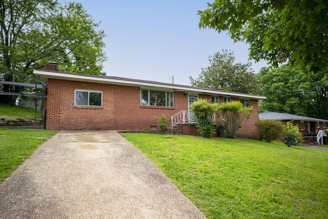 7750 Vista Hills Dr, Chattanooga, TN 37416 - ranch-style house featuring a chimney, brick siding, and a front lawn