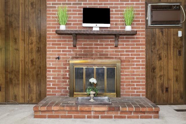 7750 Vista Hills Dr, Chattanooga, TN 37416 - detailed view of carpet floors, wooden walls, a wall mounted AC, and a fireplace