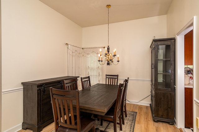 2418 Charleston Sq, Chattanooga, TN 37421 - dining space with a chandelier, light wood finished floors, and baseboards
