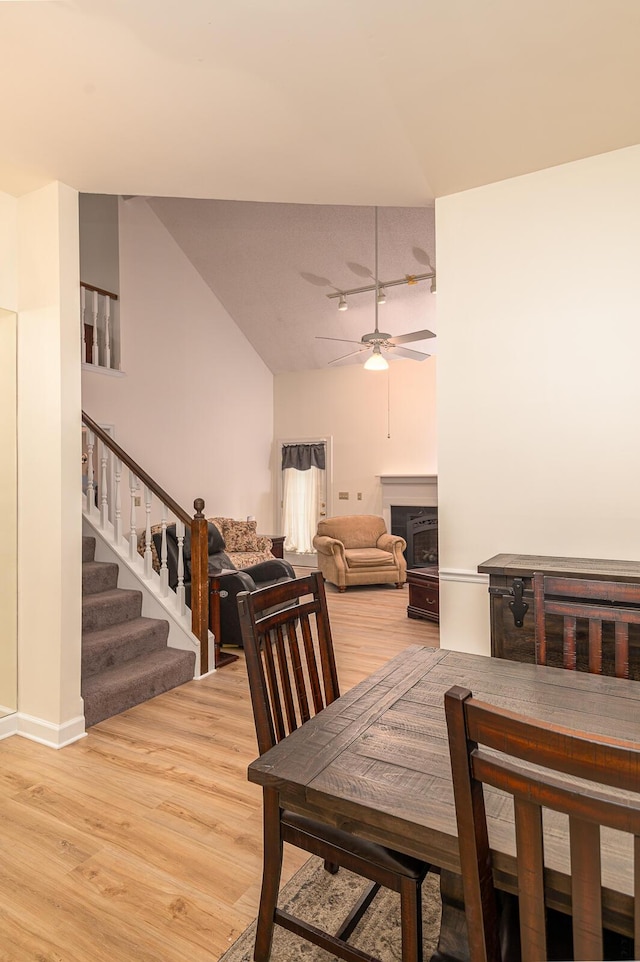 2418 Charleston Sq, Chattanooga, TN 37421 - dining room featuring light wood finished floors, stairway, and a ceiling fan