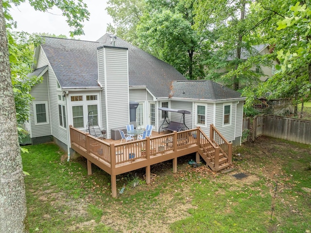 2418 Charleston Sq, Chattanooga, TN 37421 - rear view of house featuring a chimney, a shingled roof, a wooden deck, and central AC