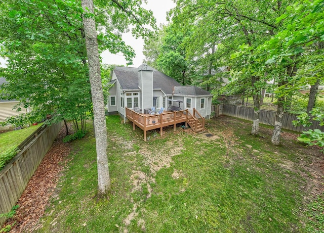 2418 Charleston Sq, Chattanooga, TN 37421 - rear view of house with a wooden deck, a chimney, and a shingled roof