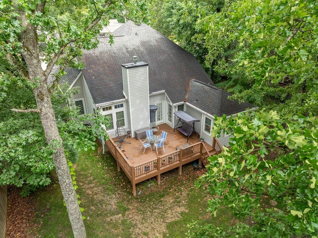 2418 Charleston Sq, Chattanooga, TN 37421 - back of property with a chimney, a deck, a shingled roof, and outdoor dining area