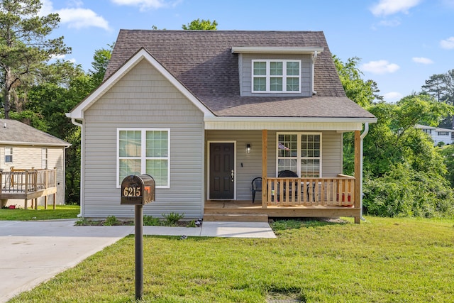 6215 Walden Ave, Chattanooga, TN 37421 - view of front of property featuring a porch, a front lawn, and roof with shingles