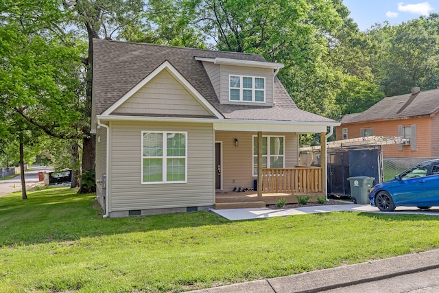 6401 Atlanta Ave, Chattanooga, TN 37421 - bungalow-style house featuring covered porch, a shingled roof, and a front yard