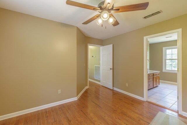 7902 Ooltewah Georgetown Rd, Ooltewah, TN 37363 - unfurnished room with ceiling fan, light wood-style floors, and baseboards