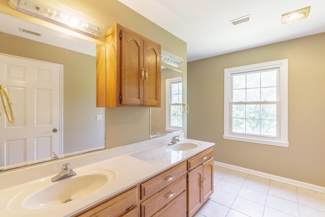 7902 Ooltewah Georgetown Rd, Ooltewah, TN 37363 - bathroom featuring double vanity, tile patterned flooring, and baseboards