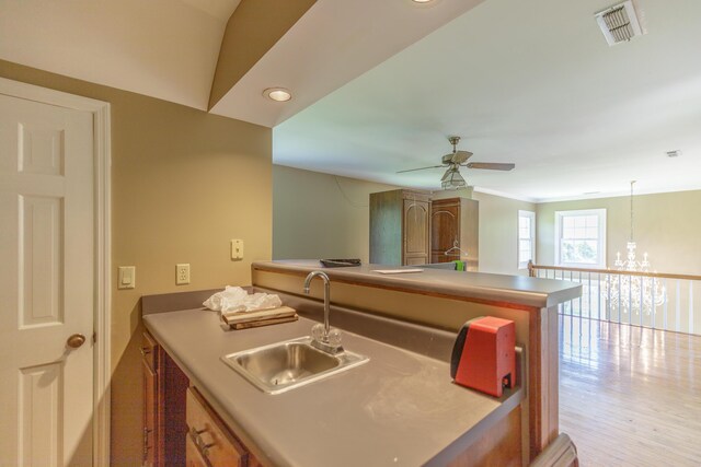 7902 Ooltewah Georgetown Rd, Ooltewah, TN 37363 - kitchen with a sink, ceiling fan, light wood-type flooring, recessed lighting, and a peninsula