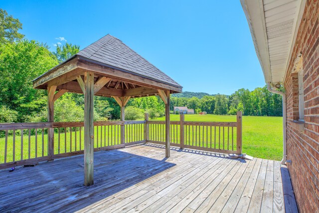 7902 Ooltewah Georgetown Rd, Ooltewah, TN 37363 - wooden terrace featuring a lawn