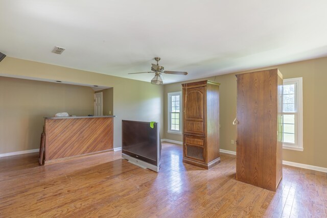 7902 Ooltewah Georgetown Rd, Ooltewah, TN 37363 - empty room with a ceiling fan, light wood-type flooring, and baseboards