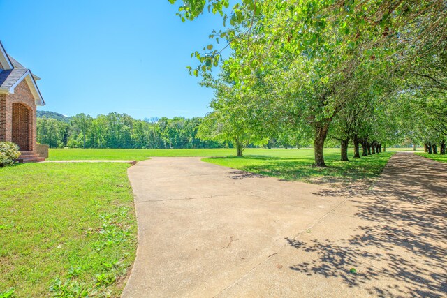 7902 Ooltewah Georgetown Rd, Ooltewah, TN 37363 - surrounding community featuring a yard