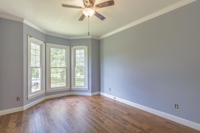 7902 Ooltewah Georgetown Rd, Ooltewah, TN 37363 - spare room featuring baseboards, wood-type flooring, and crown molding