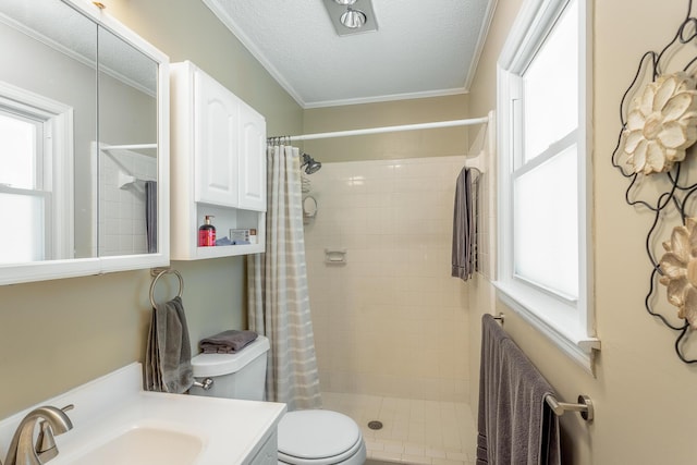 821 Ravine Rd, Signal Mountain, TN 37377 - full bath with vanity, toilet, a tile shower, and ornamental molding