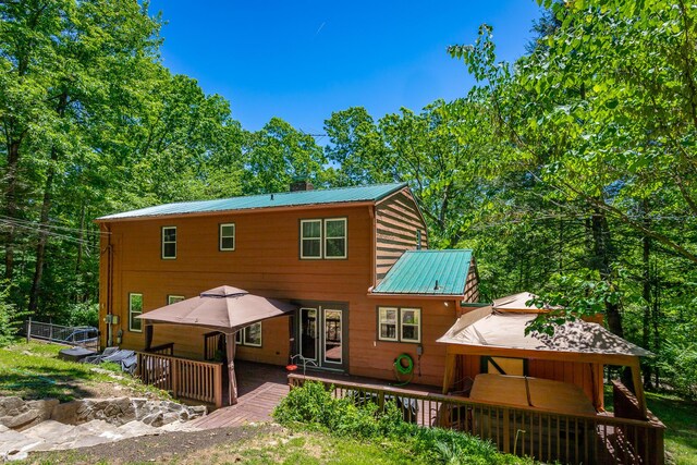 821 Ravine Rd, Signal Mountain, TN 37377 - rear view of property with metal roof and a deck