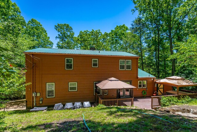 821 Ravine Rd, Signal Mountain, TN 37377 - back of property with a gazebo, a chimney, a wooden deck, and metal roof