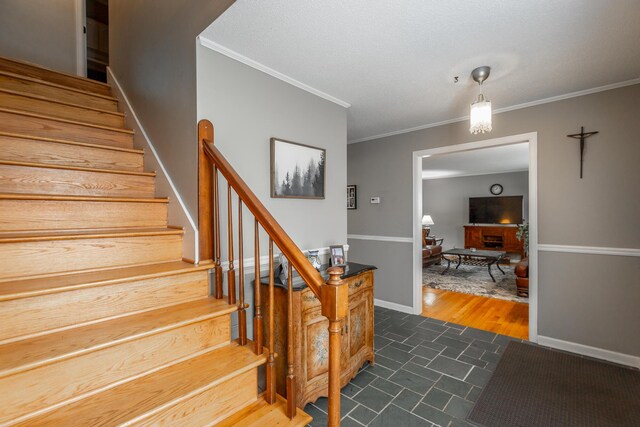 821 Ravine Rd, Signal Mountain, TN 37377 - stairway featuring crown molding and baseboards