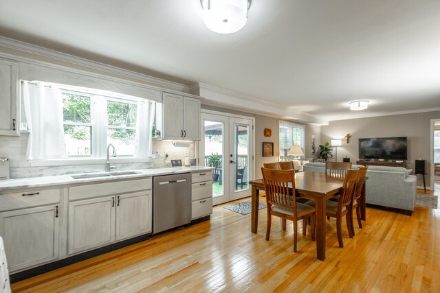 821 Ravine Rd, Signal Mountain, TN 37377 - kitchen featuring dishwasher, a sink, ornamental molding, tasteful backsplash, and light wood-type flooring