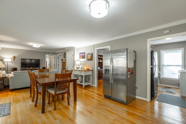 821 Ravine Rd, Signal Mountain, TN 37377 - dining space with light wood-style flooring, ornamental molding, and baseboards
