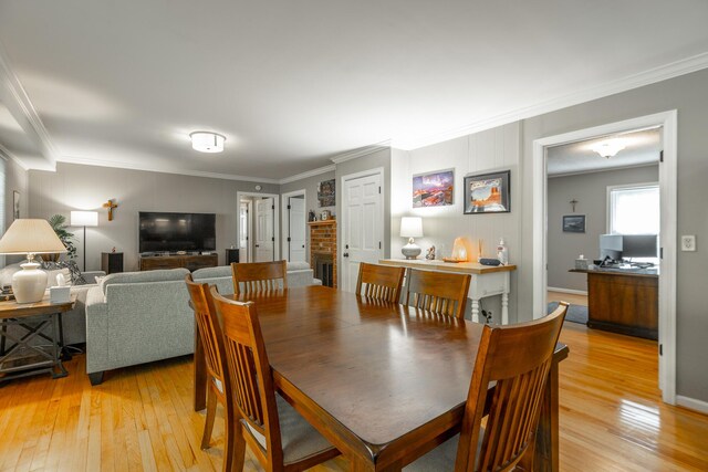 821 Ravine Rd, Signal Mountain, TN 37377 - dining space with light wood-style floors, ornamental molding, and an office area