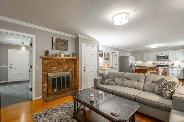821 Ravine Rd, Signal Mountain, TN 37377 - living room with ornamental molding, wood finished floors, a fireplace, and baseboards