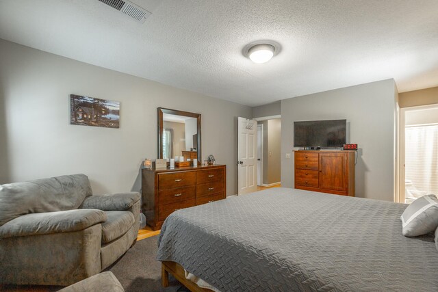 821 Ravine Rd, Signal Mountain, TN 37377 - bedroom with a textured ceiling and carpet floors