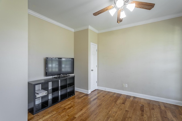 7531 Nightfall Cir, Ooltewah, TN 37363 - unfurnished living room with crown molding, baseboards, a ceiling fan, and wood finished floors