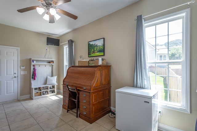 7531 Nightfall Cir, Ooltewah, TN 37363 - office area with healthy amount of natural light, baseboards, ceiling fan, and light tile patterned floors