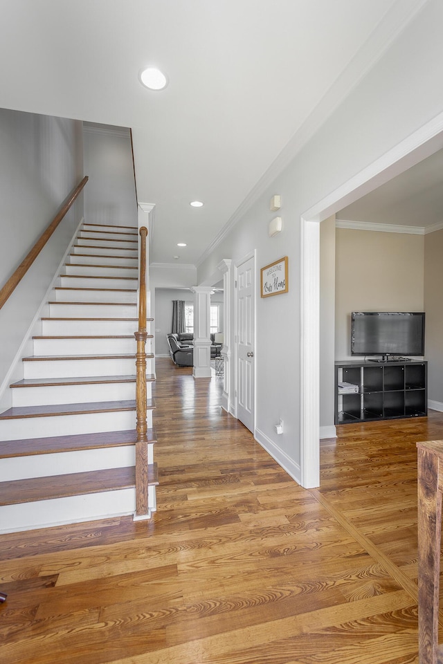 7531 Nightfall Cir, Ooltewah, TN 37363 - stairway featuring crown molding, baseboards, recessed lighting, and wood finished floors