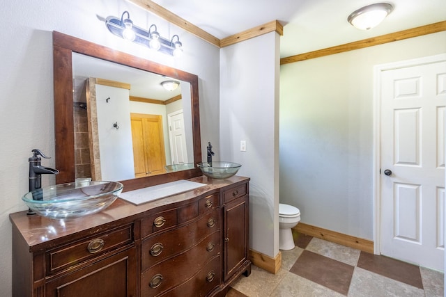 2217 Sr 399, Palmer, TN 37365 - full bathroom featuring ornamental molding, double vanity, baseboards, and toilet