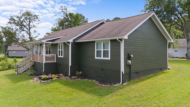 9503 Weidner Ln, Ooltewah, TN 37363 - view of home's exterior with crawl space, a yard, a shingled roof, and a porch