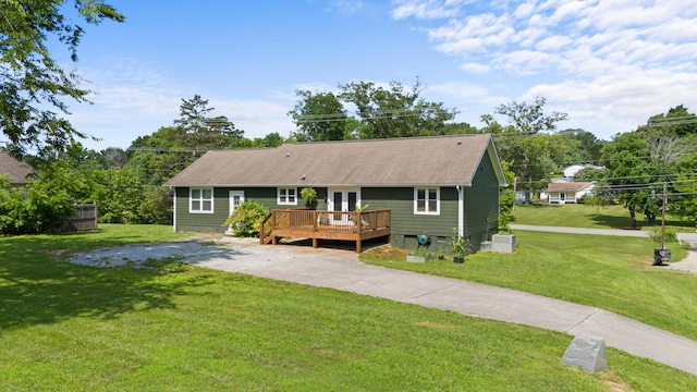 9503 Weidner Ln, Ooltewah, TN 37363 - back of house featuring a wooden deck and a yard