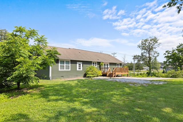 9503 Weidner Ln, Ooltewah, TN 37363 - rear view of house featuring a deck, a lawn, and crawl space