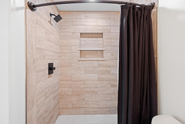 9503 Weidner Ln, Ooltewah, TN 37363 - full bathroom featuring a tile shower and toilet