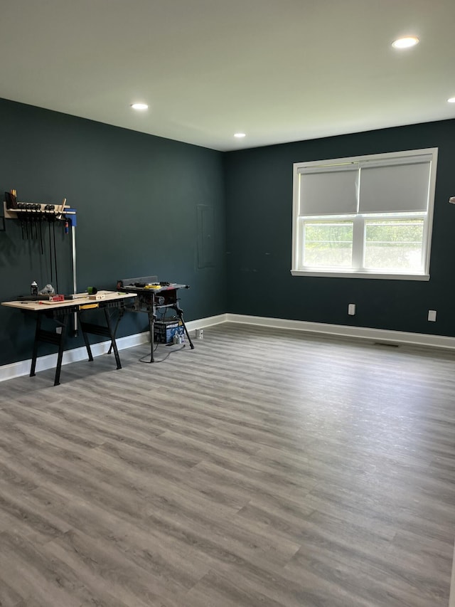 9503 Weidner Ln, Ooltewah, TN 37363 - unfurnished office with wood finished floors, recessed lighting, baseboards, and electric panel