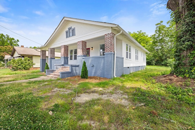 2806 N Chamberlain Ave, Chattanooga, TN 37406 - view of front of house with brick siding and covered porch