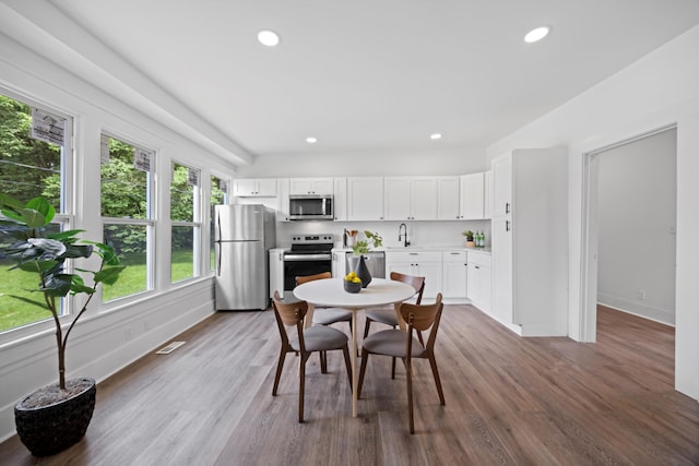 2806 N Chamberlain Ave, Chattanooga, TN 37406 - dining room with recessed lighting and wood finished floors